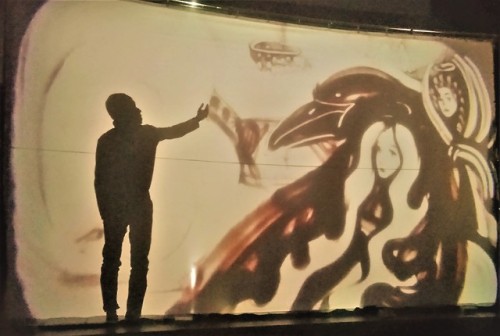 Theatre sand painting and shadows “scarab”. A play based on the poem “the Raven&rd