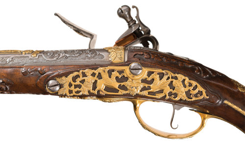 Extraordinarily decorated flintlock pistol crafted by the Dutch gunmakers Girard and Gerrit Penterma