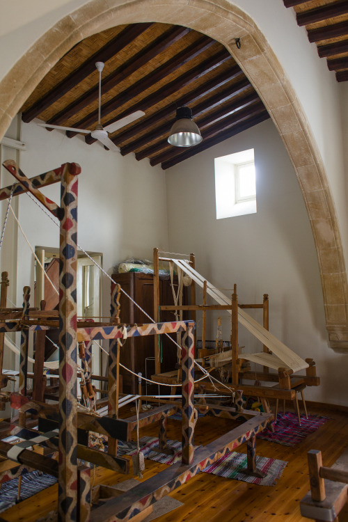 The colourful pattern on this loom is indicative of its origin, which is Eptakomi village..Painting 