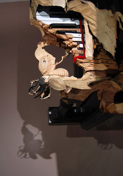 unexplained-events:  Maskull Lasserre Canadian artist who finds a way to bring out some creepy things hidden in wood.