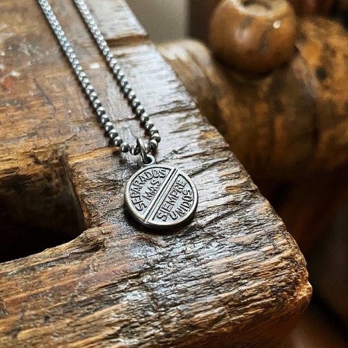 Separate but always united! This necklace by 877 Workshop is stamped with a very old steel tool from