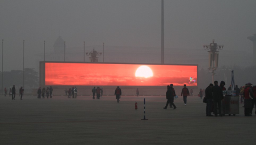 fotojournalismus - 1. The LED screen shows the rising sun on the...