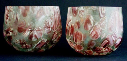 rodonnell-hixenbaugh:Pair of Roman Splashed Glass CupsA pair of ancient Roman splashed glass cups wi