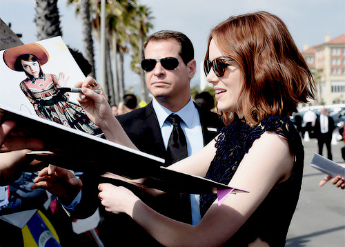 Emma Stone and Michael Keaton signing autographs at the 2015 Film Independent Spirit Awards