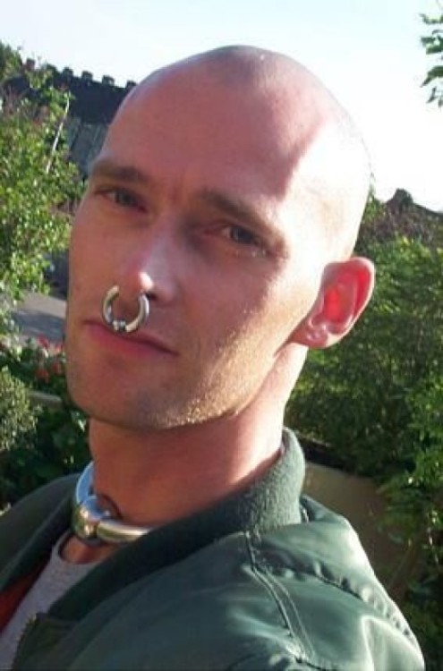 cigarboycody1: punkerskinhead: love the piercings of this skinhead The corrupted gearpig is the son 