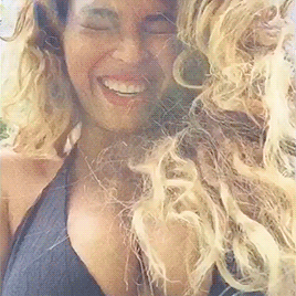 theholytrinitygifs: @BEYONCÉ: Lei’d in Hawaii😜💋 