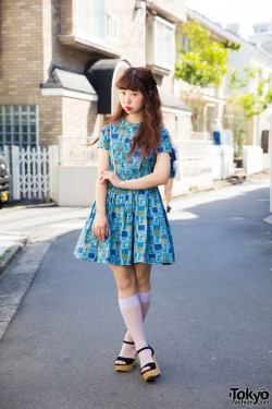 tokyo-fashion: Mio from the popular Harajuku vintage boutique G2? on the street in Harajuku wearing a 1950s cat print dress with wedges and vintage accessories. Full Look