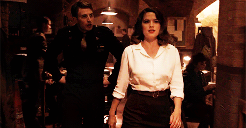 rogers:  my aesthetic: peggy carter walking like a boss while steve trails behind like a lost puppy  Relationship goals 