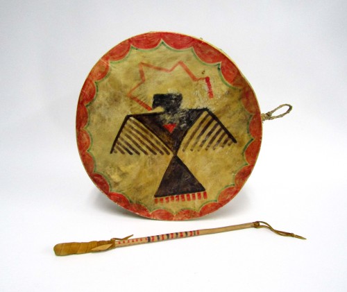 Made in 1976, this rawhide drum was made by a member of the Oneida and features a stylized eagle mot