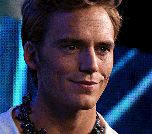 magnusedom:Sam Claflin as Finnick Odair in THE HUNGER GAMES: CATCHING FIRE (2013).