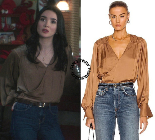  Who: Maddison Jaizani as Bess MarvinWhat: FRAME Long Sleeve Crossover Top in Bronze - $398.00Where: