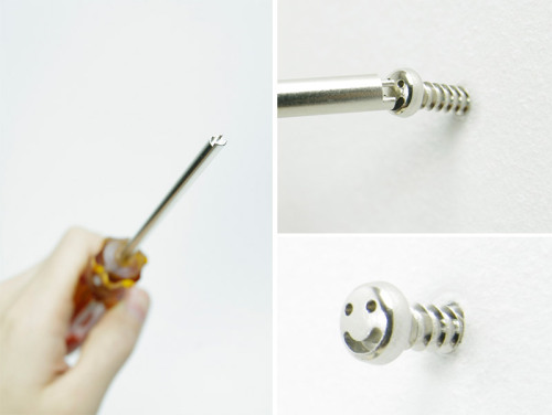 Smiley face screws by Yuma Kano