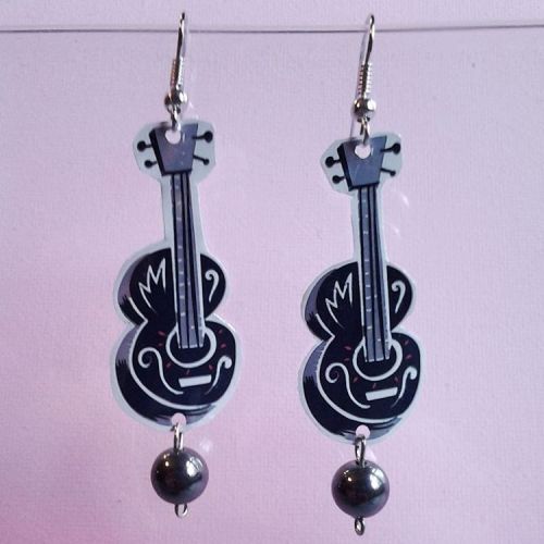 #upcycled #earrings #elpunoylamano #guitars from miller lite limited edition cans