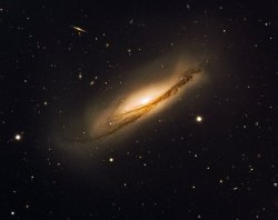 spinningblueball:  The beautiful edge-on spiral galaxy NGC 3190