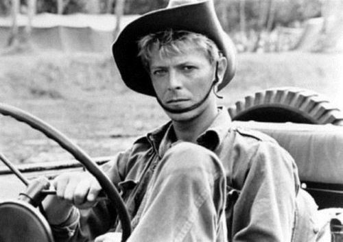 carsthatnevermadeit:David Bowie and Ryuichi Sakamoto in a Jeep in the 1983 movie Merry Christmas Mr 