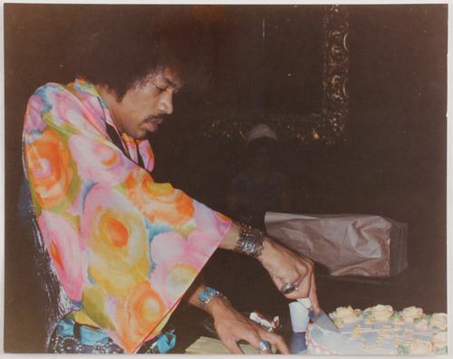phallusifer9:  Jimi Hendrix cutting his birthday cake on November 27th, 1968.