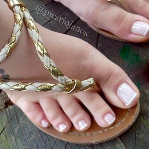 Pretty feet in braided t-strap sandals