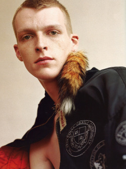 pukeboy:  Arena Homme Plus A/S 2009/2010: Popaganda &ldquo;Raf Simons: 15 Years&rdquo;Photography: Willy VanderperreStyling: Olivier RizzoModel: Robbie Snelders Nylon oversized bomber jacket with Catholic high-school badges by Raf Simons A/W 2000 