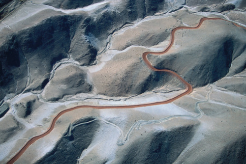 unrar:  Serpentine trail wends it way through the Cerro Verde mining region, Peru, Bobby Haas.