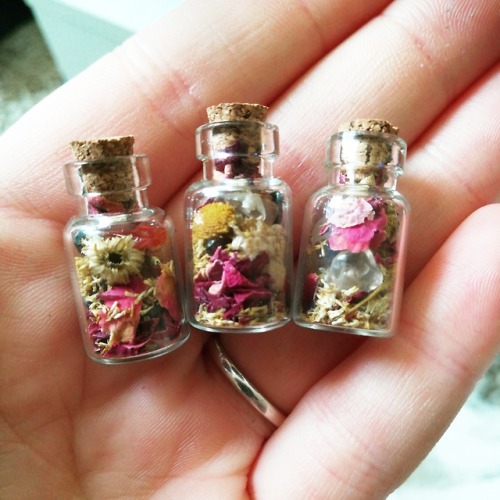 moonmaagick:Created these cute little wish bottles for love, happiness and peace.Containing:- rose p