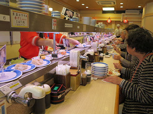 Today I had lunch at a sushi train in Kyoto, where you pick the pieces you want off a conveyor belt.