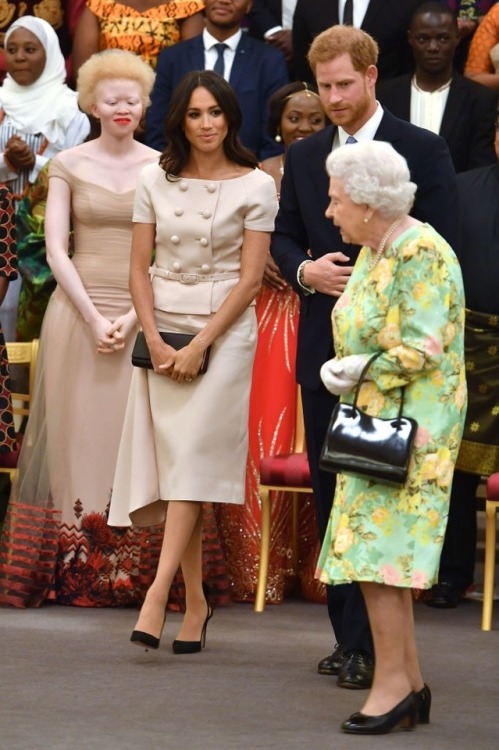 June 27: The Duke and Duchess of Sussex join The Queen for the Queen’s Leader Awards! Custom PradaAq