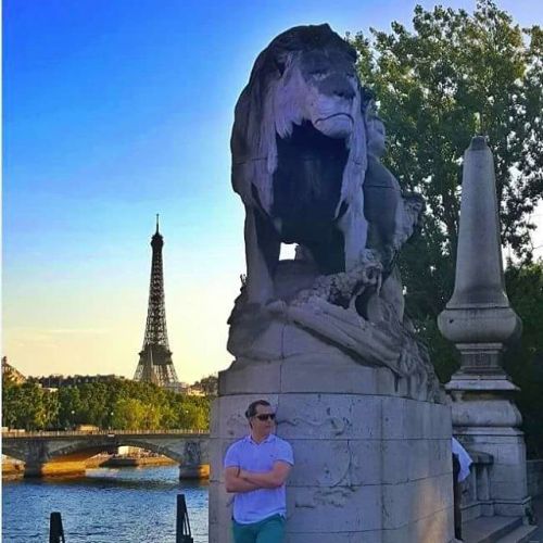 The Eiffel Tower from the Alexandre III bridge The Pont Alexandre III is a deck arch bridge that spa