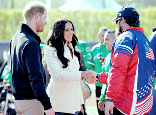 The Duke and Duchess of Sussex meet with athletes as they attend the Athletics Competition during da