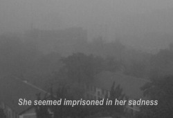 slowly-sinking-15:  She seemed imprisoned in her sadness.