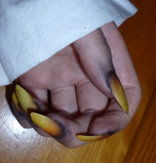 I just found out that you can use acrylic paint to make your nails look like gross claws! You put on