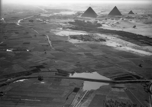 Aerial view from north of cultivated Nile valley with the pyramids in the background, 1938