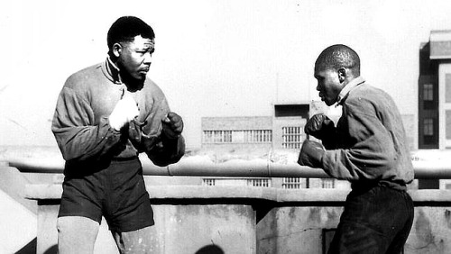 the-history-of-fighting:A young Nelson Mandela doing some boxing training.“Boxing is egalitari