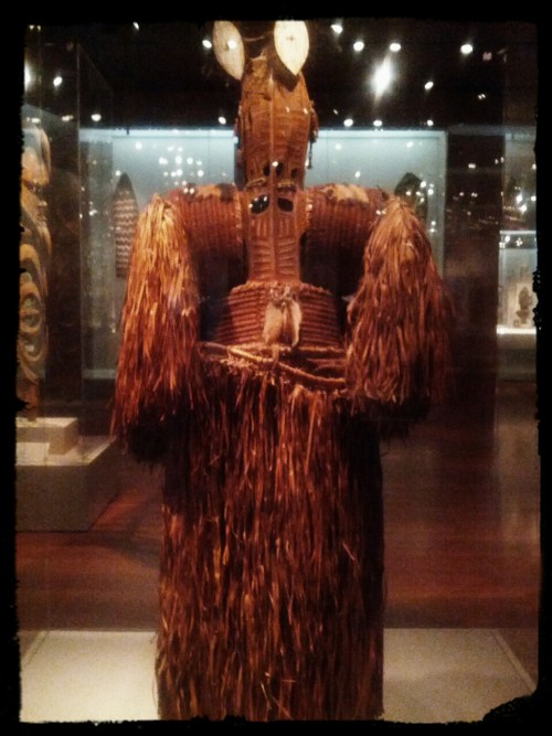 Spirit Mask Costume. SW Coast, Asmat people. 20th Century. Fiber, cassoway feather, cockatoo, red an