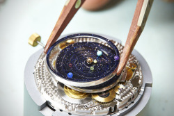 brain-food:  The Midnight Planetarium watch from Van Cleef &amp; Arpel’s Poetic Astronomy series tells time via a shooting star that rotates along the outmost area of the face, as well as, on a much bigger scale, movement of the planets. Featuring
