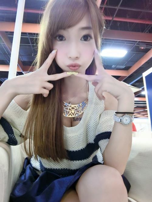 cutiespress:   Sandy Taiwanese fair skinned promotional model  More Images Cuties Press - http:
