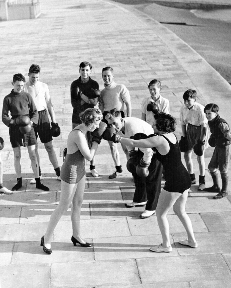 Reg Speller - Two female members of a keep fit group learn boxing techniques as part