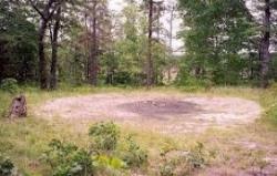 ghoulcatt:  Devil’s Tramping Ground (North Carolina)- Pictured Above:  &ldquo;The Devil’s Tramping Ground is a mysterious, perfectly round and absolutely barren circle about forty feet in diameter in the pine woods of Chatham County. Not a tree, not