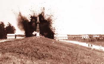 The levee at Caernarvon, Louisiana is dynamited in April, 1927. Beset by massive flooding (some rain