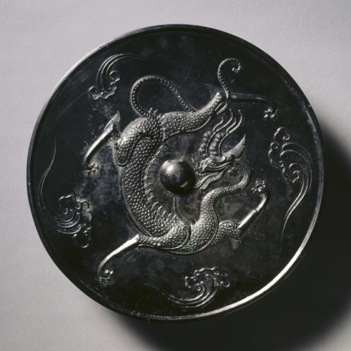 panicinthestudio:cma-chinese-art:Mirror with a Coiling Dragon, 700, Cleveland Museum of Art: Chinese