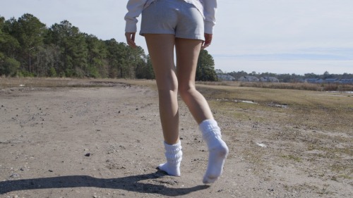 “Muddy Slouch Socks” is now available at www.seductivestudios.comIn this custom video, Roxy walks outside in the mud pits in her bright white slouch socks. She gradually gets them muddier and muddier, slopping around, and stepping in the wet, sticky