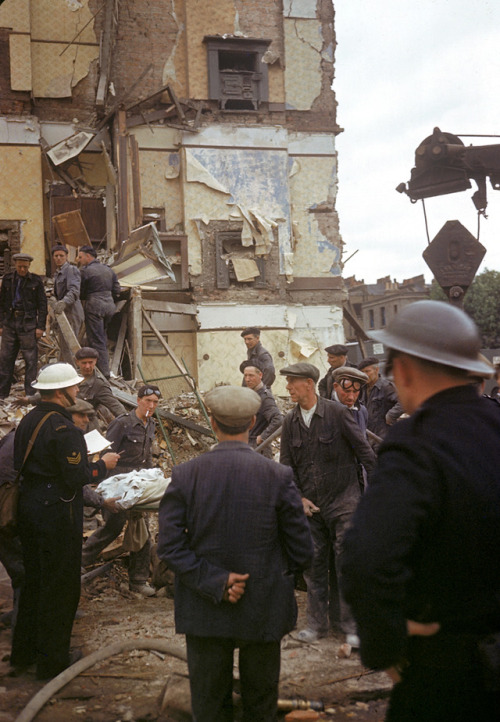 A London Civil Defence Rescue crew helps remove injured and dead civilians from destroyed buildings 