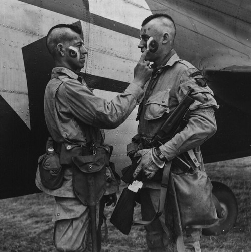 kat-har:tora42:kielmeau:Mohawk Indians Applying War Paint in Preparation for D-Day. June 1944Their n