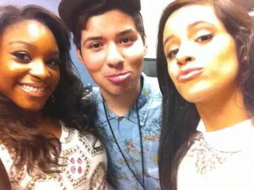 Mani and Camila with a fan