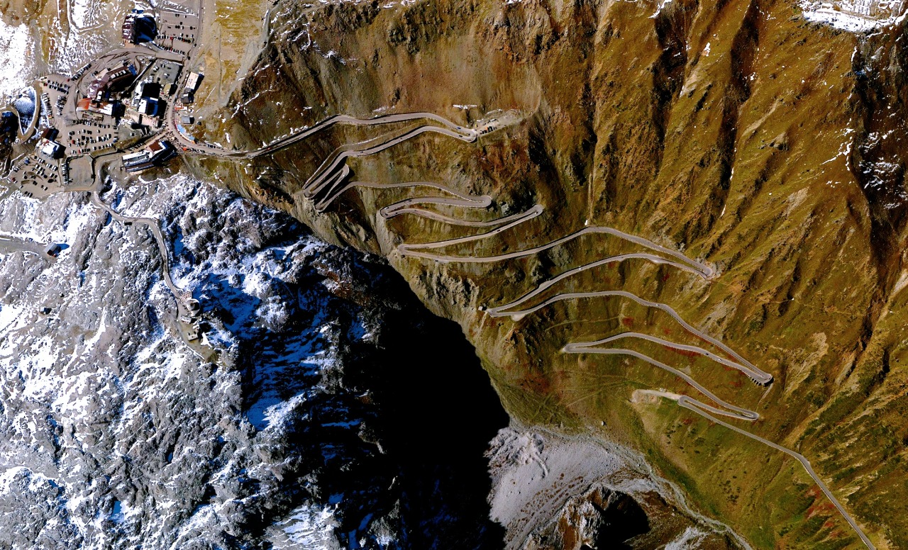 dailyoverview:The Stelvio Pass is a road in northern Italy that is the highest paved