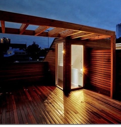 Rooftop Deck In MelbourneImage Of A Mid-sized, Stylish Rooftop Deck With A Pergola