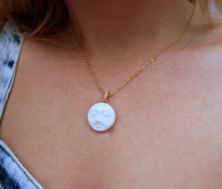 littlealienproducts:  Reversible Moon Face Necklace by  CrossStreetJewelry  