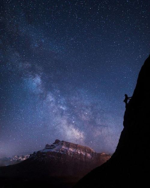 paulzizkaphoto:One climber and one hundred billion stars on a stunning night in Banff National Park.