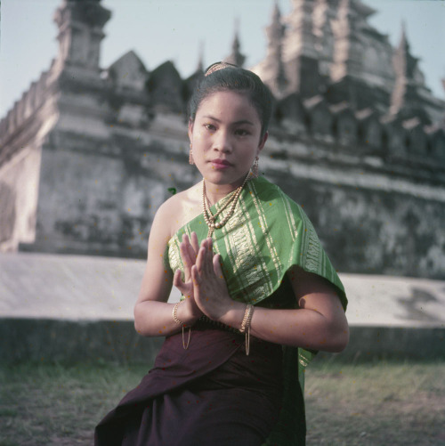 Schoolgirls in Laos performing traditional dances, 1955(via Library and Archives Canada)