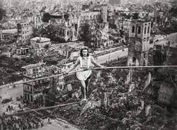 badassentity:Margrethe Zimmermann on a rope over the ruins of Cologne. Germany. 1946 year