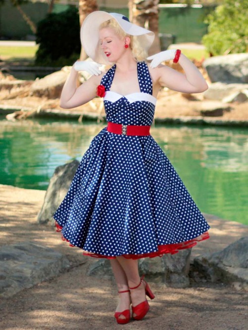 redath:(via www.bluevelvetvintage.com/images/P/repr0703%20classic-dame-navy-polka-dot-halter